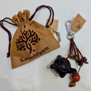 handcrafted turtle-shaped keychain charm