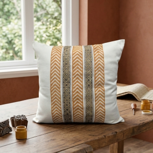 Elegant rustic cushion cover with warm mustard patterns and minimalist striped design, perfect for cozy and stylish home décor.