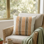 Elegant rustic cushion cover with warm mustard patterns and minimalist striped design, perfect for cozy and stylish home décor.