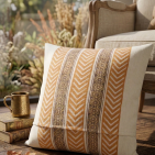Elegant rustic cushion cover with warm mustard patterns and minimalist striped design, perfect for cozy and stylish home décor.