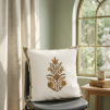 Minimalist cushion cover with elegant floral buta motif in warm earthy tones, perfect for adding a refined touch to home décor.